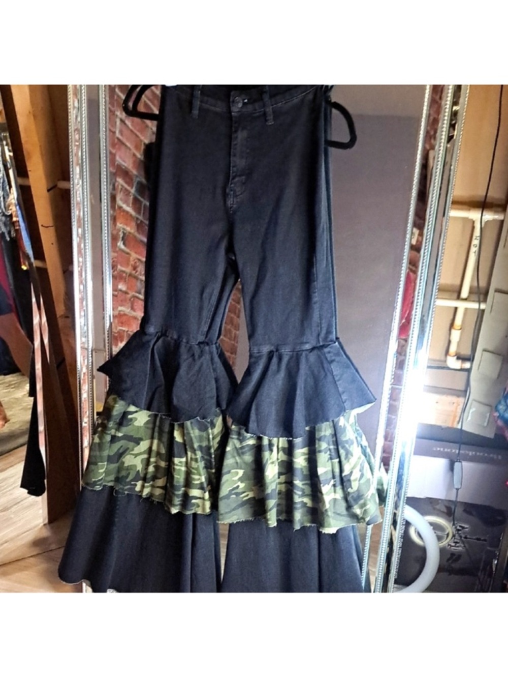 AKIRA Black Flare Jeans with Camo Ruffle Tiers